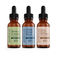 Load image into Gallery viewer, Three amber dropper bottles of Nootrocan 3000mg 10% Full Spectrum CBD Nootropic Oil - 30ml. From left to right, the labels read &#39;Relax &amp; Unwind,&#39; &#39;Plant Based Boost,&#39; and &#39;Plant Based Immunity.&#39; Each bottle contains 20ml of product crafted from organic hemp. The labels are green, blue, and peach, respectively.
