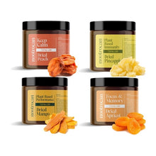 Load image into Gallery viewer, Four jars of Nootrocan 750mg Full Spectrum CBD Nootropic Dried Fruits - 300g, renowned for being vegan-friendly and nootropic, are displayed. The first jar, labeled &quot;Keep Calm,&quot; contains dried peaches. The second jar, named &quot;Plant Based Immunity,&quot; holds dried pineapple. The third jar, called &quot;Plant Based Performance,&quot; features dried mango. Finally, the &quot;Focus &amp; Memory&quot; jar offers dried apricot.
